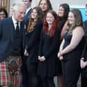 King Charles III leaves the Scottish Parliament at Holyrood with a guard of honour from members of the Scottish Youth Parliament, including Emma-May Millar from Denny, second right. Pic: Andrew Milligan
