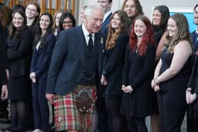 King Charles III leaves the Scottish Parliament at Holyrood with a guard of honour from members of the Scottish Youth Parliament, including Emma-May Millar from Denny, second right. Pic: Andrew Milligan