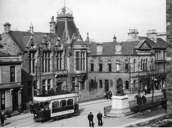 The burgh buildings pictured in 1905 with one of the first trams.