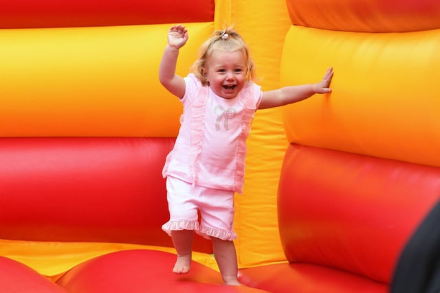 Every good fun day has to have a bouncy castle ... as this youngster knows.