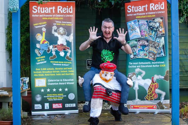 Wallacestone dad-of-two Stuart Reid is celebrating 10 years as a full time children's author.  Pic: Scott Louden.