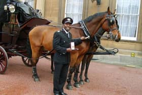 Wayne McCollin receiving his Queen’s Fire Service Medal in 2006 when he was Assistant Chief Officer at Lothian & Borders.