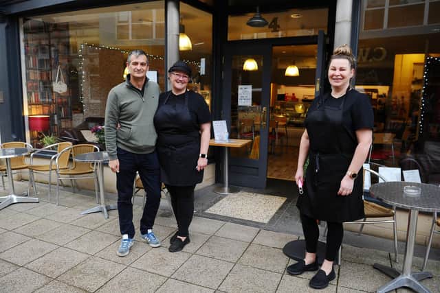 Edward McMaster and Louise McKnight, owners of Falkirk cafe 4 Coo Wynd, with Michelle Chalmers, manager. Not pictured: Jordan McMaster, part-owner. Picture: Michael Gillen.