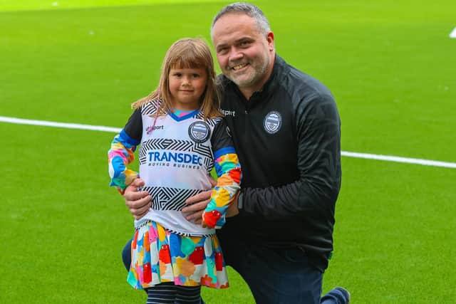 East Stirlingshire CEO Fraser Cromar with his six-year-old daughter Mirryn (Pic Scott Louden)
