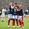 Agyeman is mobbed by his Falkirk teammates after netting the opener against Edinburgh City (Photo: Michael Gillen)