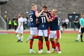 Agyeman is mobbed by his Falkirk teammates after netting the opener against Edinburgh City (Photo: Michael Gillen)