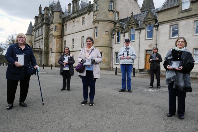 Music directors Kim Edgar and Mariot Dallas presented members with iPads, awarded through the Connecting Scotland scheme. Picture: Michael Gillen.