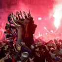 Rangers fans gather in George Square to celebrate the club winning the Scottish Premiership for the first time in 10 years (Photo by Jeff J Mitchell/Getty Images)