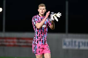 Falkirk goalkeeper Nicky Hogarth applauds the home support in the Kevin McAllister Stand (Photo: Michael Gillen)