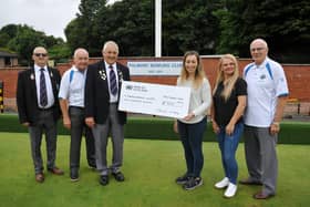 Polmont Bowling Club raised £1000 for Strathcarron Hospice through this year's Hawsir Trophy memorial event in honour of former member Robin Close (Rocky). Pictured: Ronnie Macleod, treasurer; John Gray, member; Ian Doig, president; Claire Kennedy, Strathcarron's community fundraiser; Tracy Wilson, bar manager; and Gordon Pyle, member. Picture: Michael Gillen.