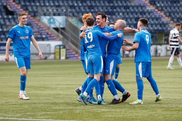 Bo'ness United players celebrate the winning goal (Pictures: Scott Louden)