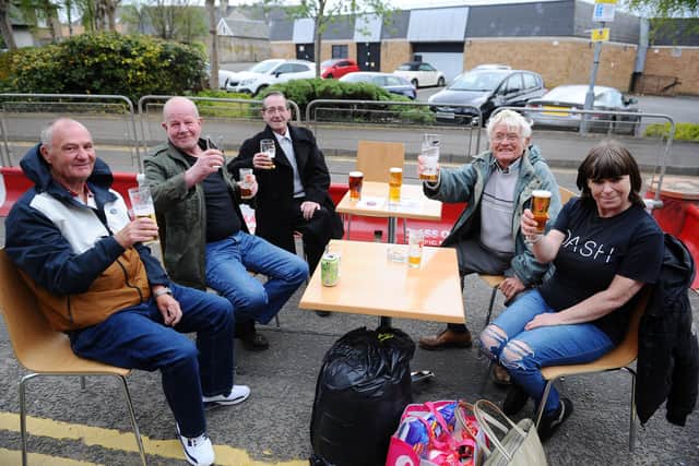 Customers enjoy a drink outside The Courtyard in Falkirk. Picture: Michael Gillen.