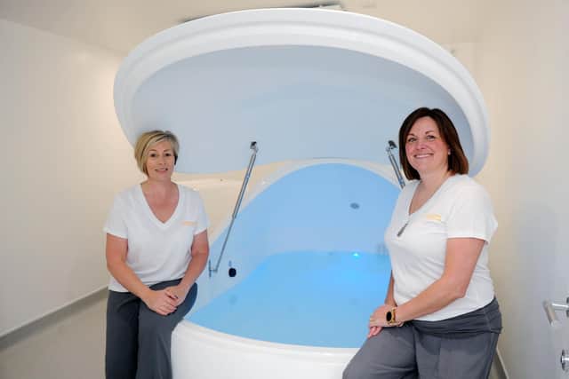 Res(e)t Float Centre owners Susan Bell (left) and Donna Dick show off one of their i-sopod flotation tanks