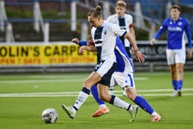 Picture Michael Gillen. DUMFRIES, Palmerston Park Stadium. Queen of the South FC v Falkirk FC. Season 2023 - 2024. SPFL cinch League One. Aidan Nesbitt 10.