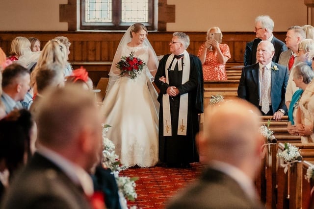 Elise, a solicitor, and Thomas, an off-shore worker, met at a Madrid music festival in June 2019 and only got engaged at Christmas. The couple, both 38, now live in Inverness. Elise was always determined to marry in the Stenhousemuir church where her family has been the minister for a number of years. She said it was a very special day and they were joined by 120 family and friends to celebrate the occasion. Pic: Connor Barrett Photography