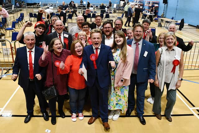 New Labour MP for Falkirk Euan Stainbank celebrates with family and supporters after the announcement. Pic: Michael Gillen
