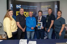 Joining Provost Robert Bissett at the Asda Distribution Depot prostate testing session are Niamh Lyons, event assistant EDX medica, Carl Taylor, event manager EDX medical, Jim Finnie, Asda HGV driver Asda, Colin Chapman, Asda depot general manager, and Sasha Harrison, head phlebotomist GFCT (Picture: Michael Gillen)