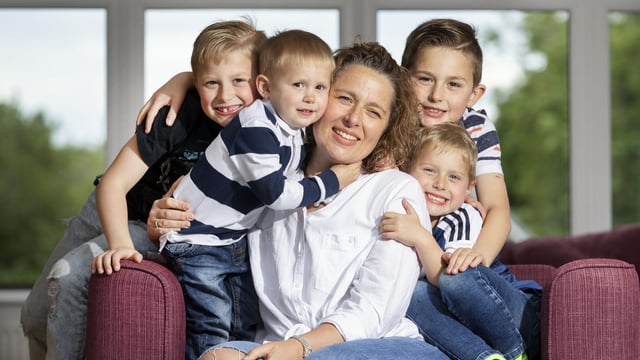 Lynsey Ritchie at home with her boys Odhran, three, Darragh, five, Brodie, seven, and Cailean, nine