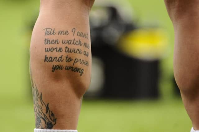 Callumn Morrison's tattoo on his leg, pictured during the 3-1 win over Airdrie - 'Tell me I can't, then watch me work twice as hard to prove you wrong'