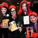 Pupils Morgan Meldrum, Clare Campbell, Andrew Stowe and Jessica Donaghie each holding a short-listed book for 2012.