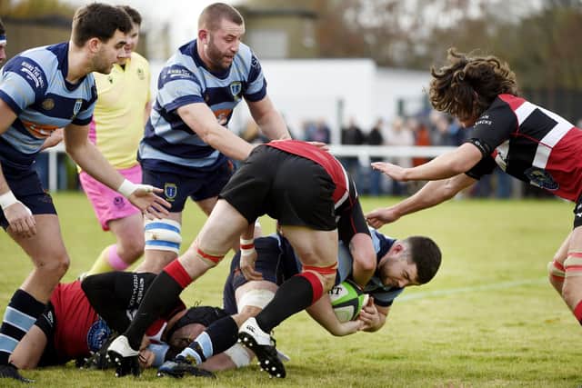 Falkirk ace Andrew McNab being tackled against Lasswade last Saturday (Pics by Alan Murray)