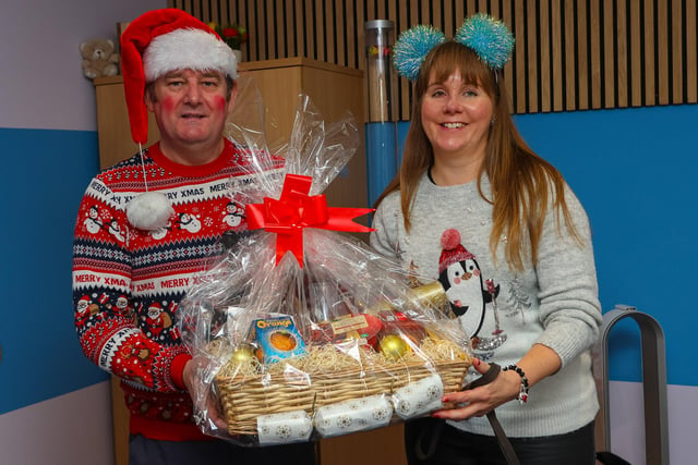 Duncan and Laura with the raffle prize