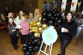Volunteers and friends and family celebrate the first year of Grangemouth Saturday Lunch Club 
(Picture: Alan Murray, National World)