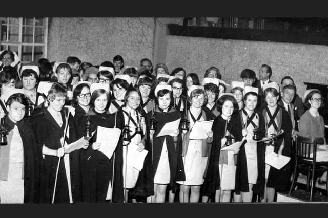 Falkirk Infirmary nurses sing carols round the wards in the 1960s.