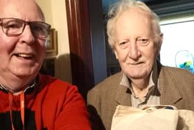Michael Lynch delivering a winter warmer pack to Food Train member John Colman. Pic: Contributed
