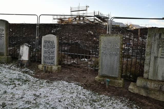 The grounds in Airth cemetery had debris and soil run into it from Lochay Homes Castle Gate construction site. Pic: Michael Gillen