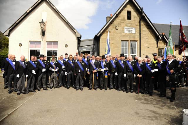 The Free Colliers prepare to take part in their annual march through the villages of the Braes last August. Pic: Alan Murray