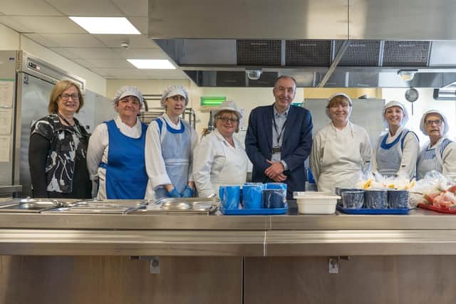 Janette Forsyth with the school's catering team and Falkirk Council's chief executive, Kenneth Lawrie.