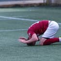 Robert Thomson can't believe it after his struck wide after rounding the goalkeeper (Pictures: Scott Louden)