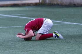 Robert Thomson can't believe it after his struck wide after rounding the goalkeeper (Pictures: Scott Louden)