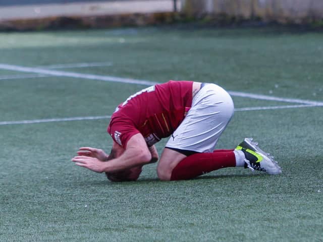 Robert Thomson can't believe it after his struck wide after rounding the goalkeeper (Pictures: Scott Louden)