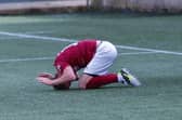 Robert Thomson can't believe it after his struck wide after rounding the goalkeeper (Pictures: Scott Louden)