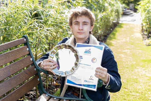 Working on the bench project helped St Mungo's pupil Shane Montague achieve both a school award and the nationally recognised Saltire Award.  (Pic: Michael Gillen)