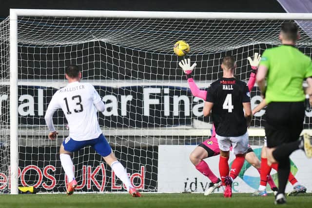 Rory McAllister scores the second goal of the match (Pics Michael Gillen)