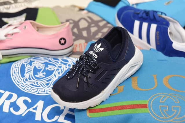 Fake designer labels are removed from clothing and it's given to charities, while the soft rubber from trainers can be re-used for children's playparks.