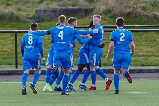 Bo'ness Athletic players celebrate Tiwi Daramola's equaliser in the first half (Pictures by Scott Louden)