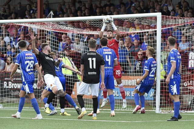 St Johnstone stopper Ross Sinclair saves in a crowded penalty box