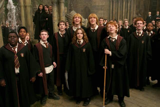 Chris Rankin as Percy Weasley with the Harry Potter cast