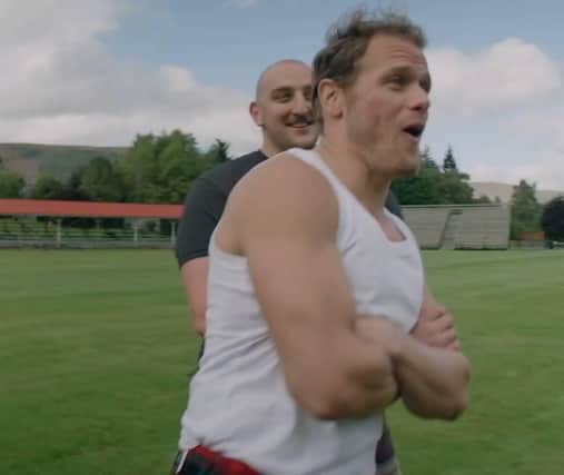 Local Highland Games competitor Kyle Randalls and actor Sam Heughan in "Men in Kilts"