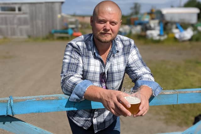 Strangers Brewing Co. founder and head brewer Brett Welch at Narrowboat Farm.