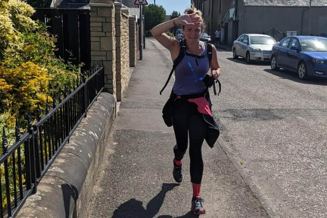 Runner Dorothy Balfour clocked up more than 300 miles in an attempt to support businesses in Falkirk.