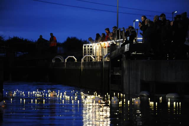 There were 96 lanterns placed in the water next to the Queen Elizabeth II Canal to mark every year of the late Queen's life