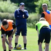 Manager John McGlynn speaks to the players during a training session at Little Kerse (Photos: Michael Gillen)