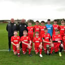 Camelon Juniors’ 2010s team pictured with their Blackpool International Cup Youth Tournament trophy after winning the competition earlier this month (Photo: Michael Gillen)