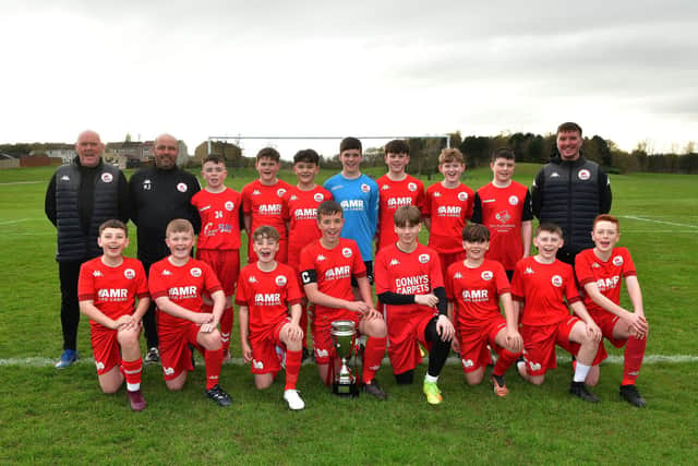 Camelon Juniors’ 2010s team pictured with their Blackpool International Cup Youth Tournament trophy after winning the competition earlier this month (Photo: Michael Gillen)