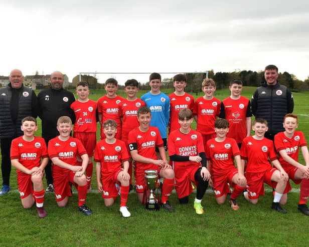 Camelon Juniors’ 2010s team pictured with their Blackpool International Cup Youth Tournament trophy after winning the competition earlier this month (Photo: Michael Gillen)